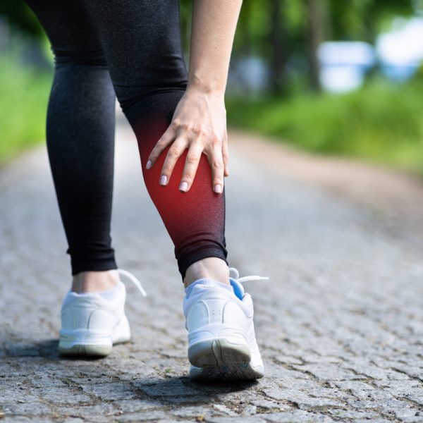 Calf Injury And Cramp Pain. Sport Athlete Jogging